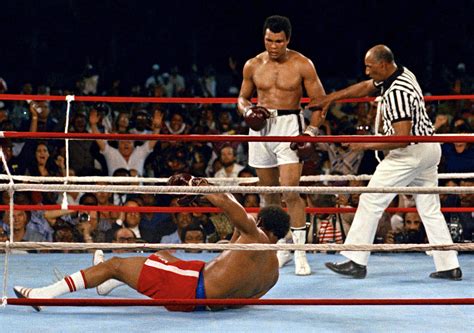 Aerial view of George Foreman on his back as referee Zach Clayton makes his count during the round eight knockdown by Muhammad Ali at the WBC/ WBA World ...